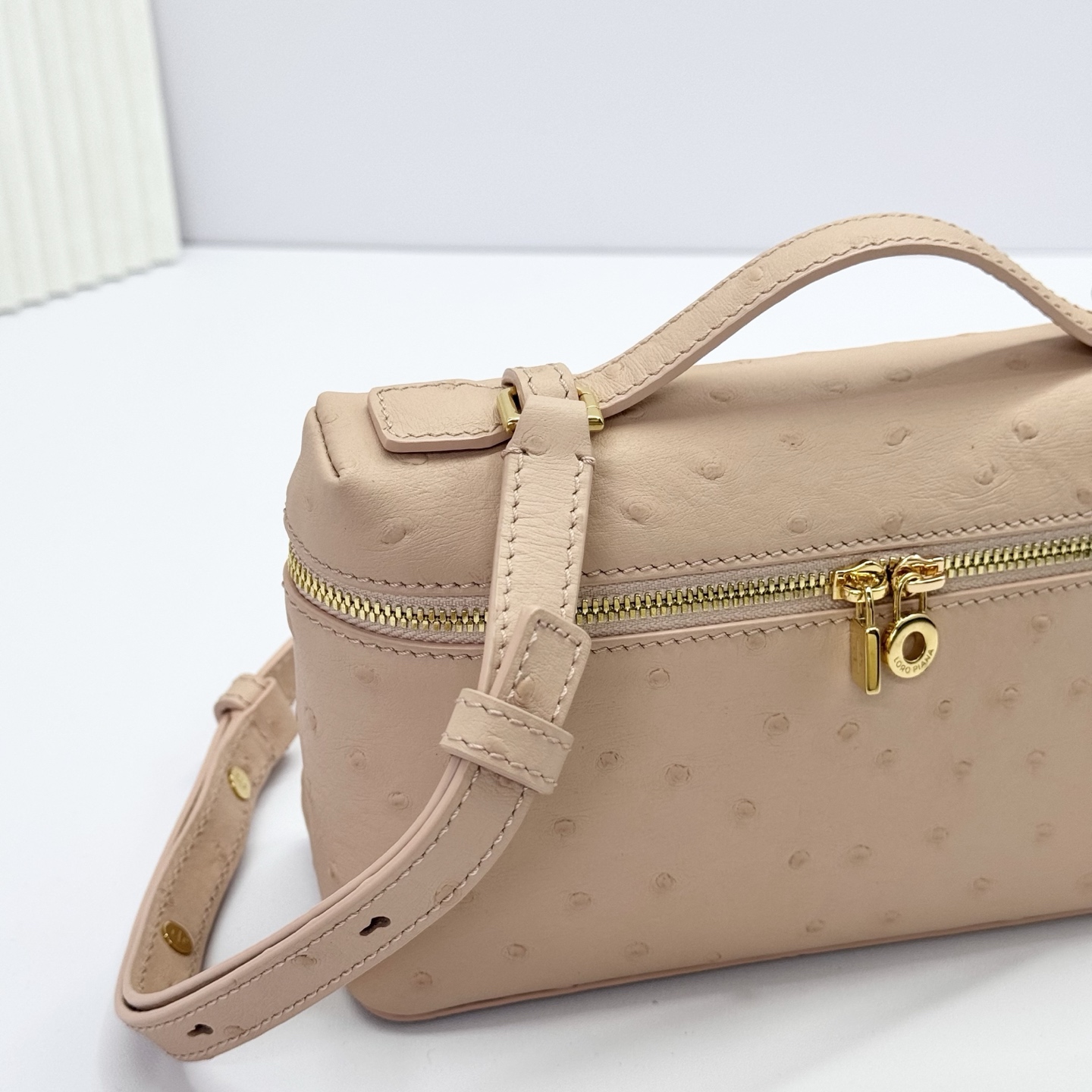 Loro Piana Extra Pocket Charm Ostrich Leather Oryx beige| Loro Piana US
