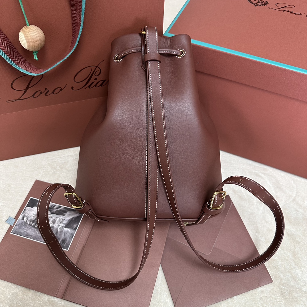 Loro Piana Drawstring Leather Backpack | red Brown