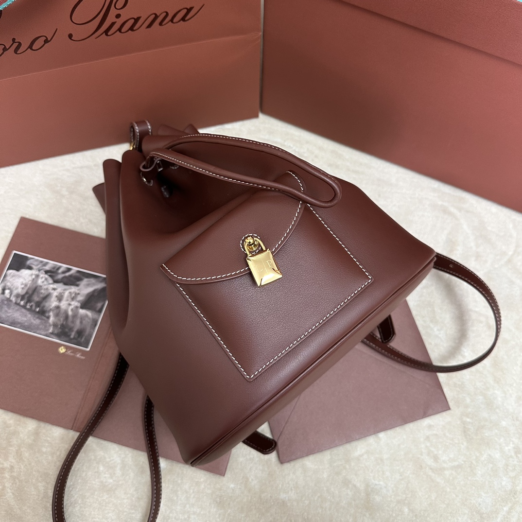 Loro Piana Drawstring Leather Backpack | red Brown