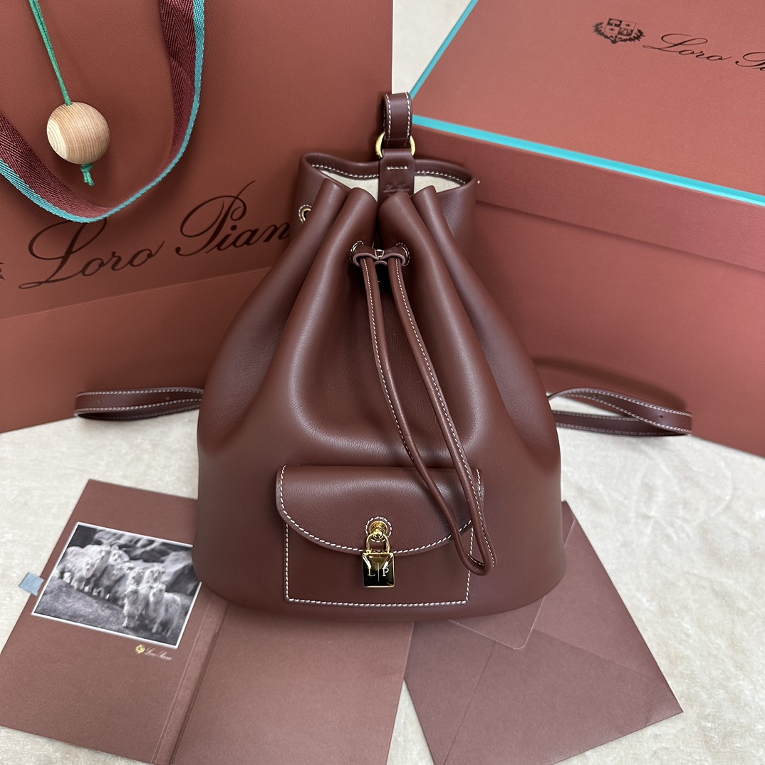 Loro Piana Drawstring Leather Backpack | red Brown