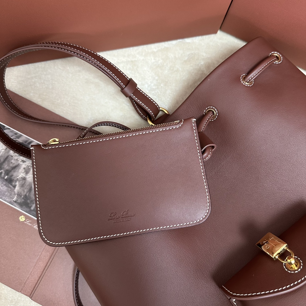 Loro Piana Drawstring Leather Backpack | red Brown