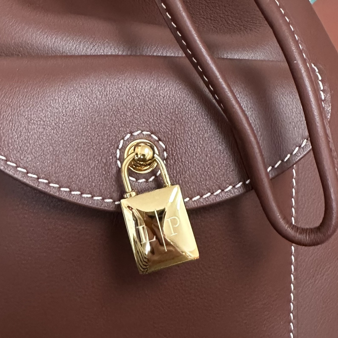 Loro Piana Drawstring Leather Backpack | red Brown