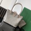 Goyard luxury leather bag in blue and beige with top handles
