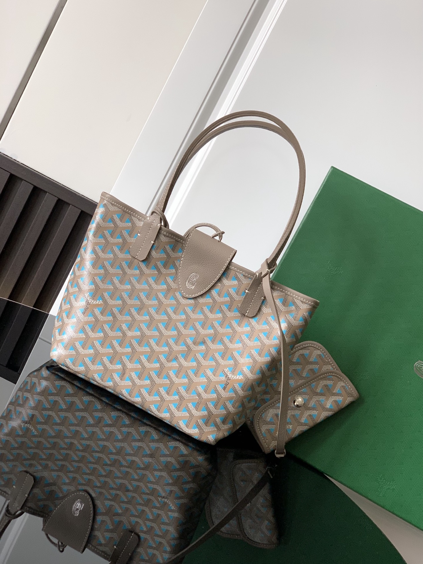 Goyard luxury leather bag in blue and beige with top handles
