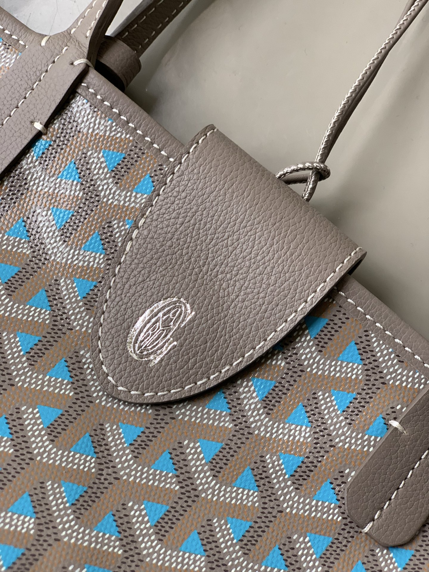Goyard luxury leather bag in blue and beige with top handles