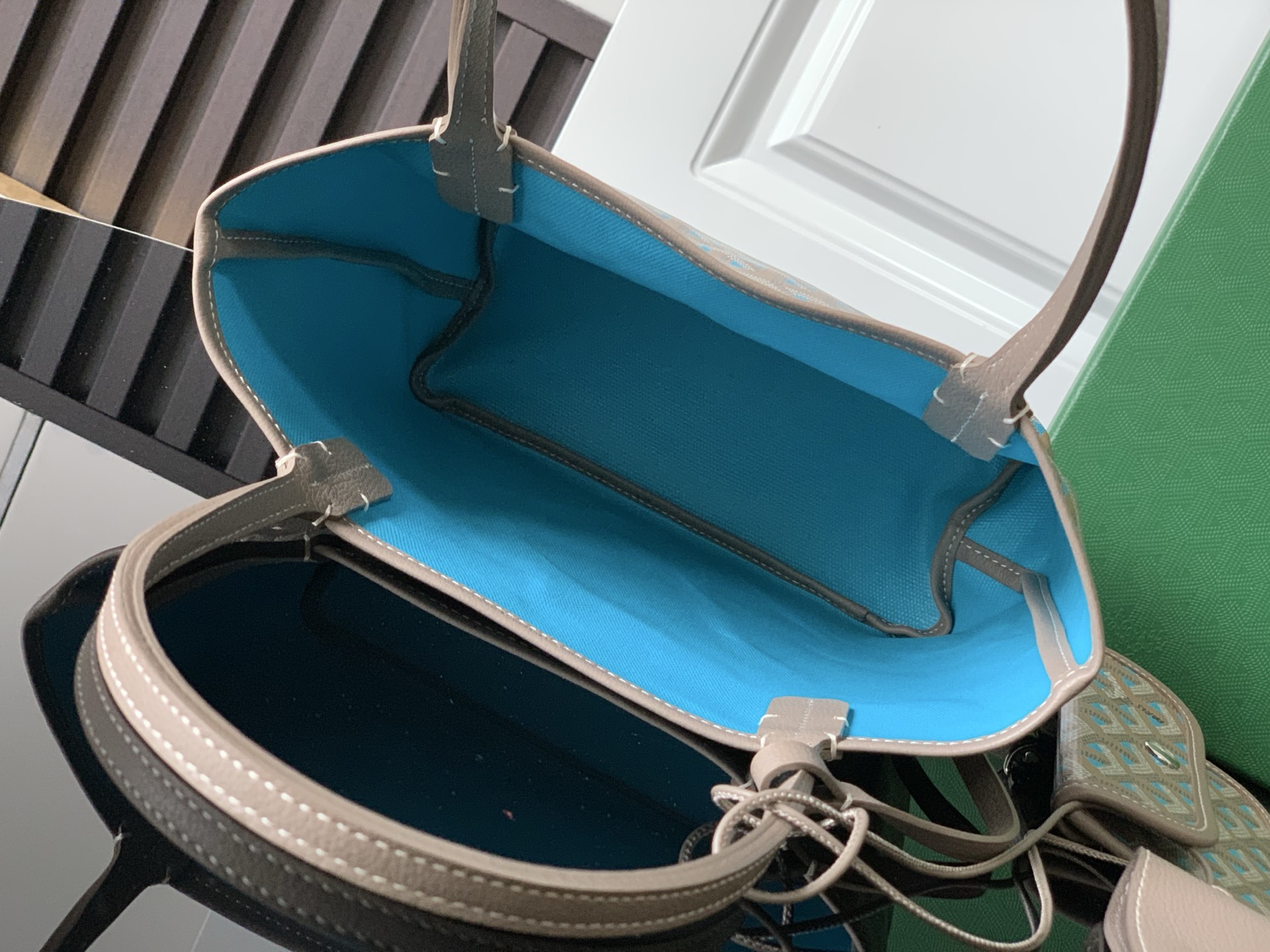 Goyard luxury leather bag in blue and beige with top handles