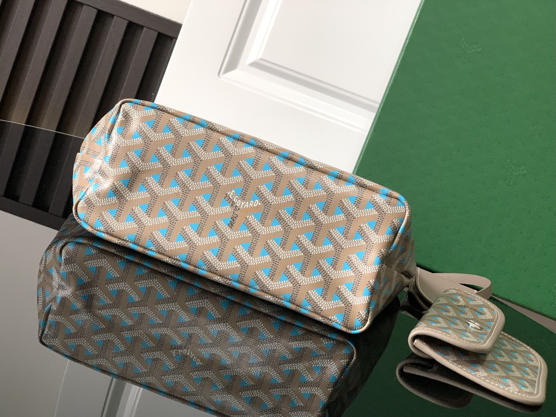 Goyard luxury leather bag in blue and beige with top handles