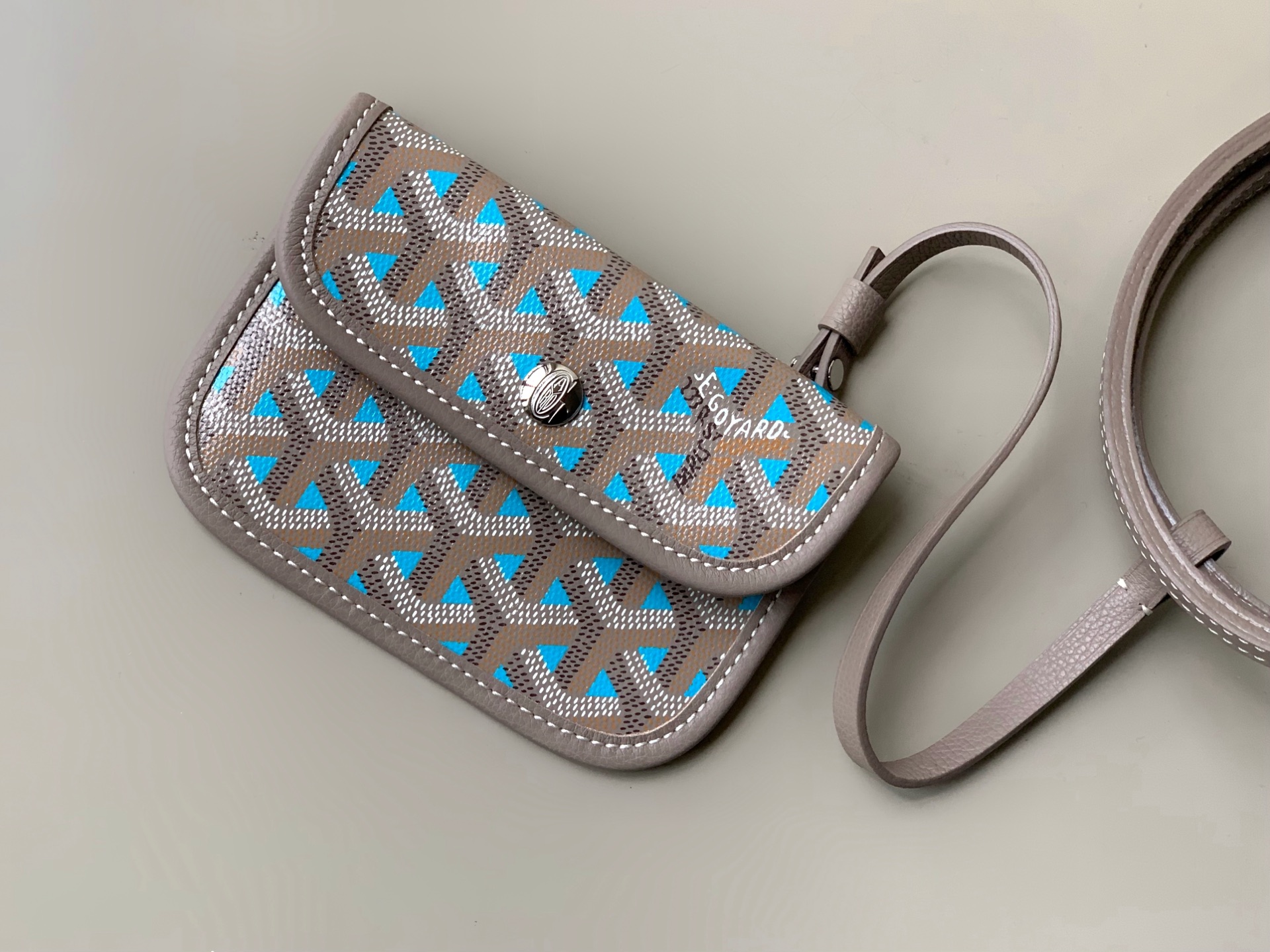 Goyard luxury leather bag in blue and beige with top handles