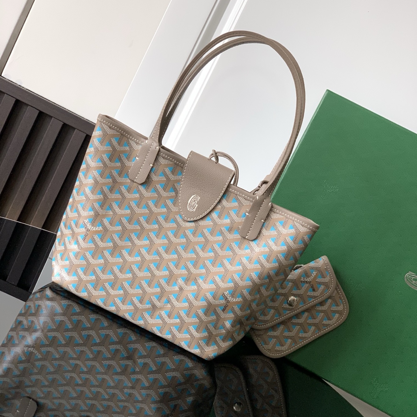 Goyard luxury leather bag in blue and beige with top handles