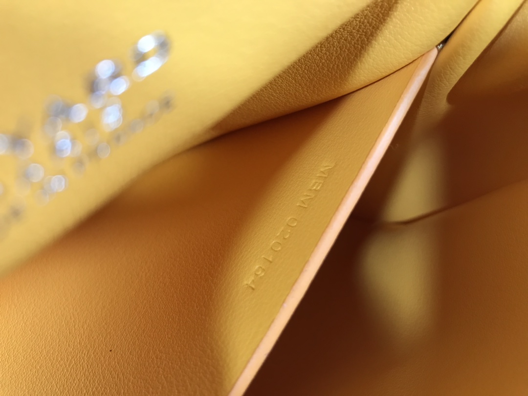 Goyard White Goyardine Coated Canvas and Leather Mini Saigo