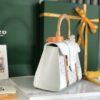 Pre-owned Goyard Goyardine Saigon Structured PM White |