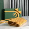 GOYARD Goyardine Varenne Continental Wallet yellow