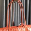 Goyard orange Goyardine Coated Canvas and Leather