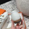 Women's White Leather Hermes Tassel Loafers with Gold H Logo,