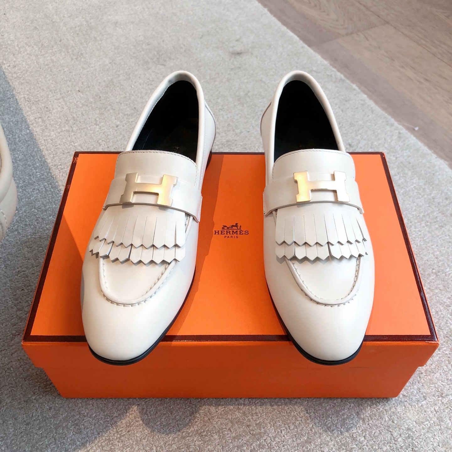 Women's White Leather Hermes Tassel Loafers with Gold H Logo