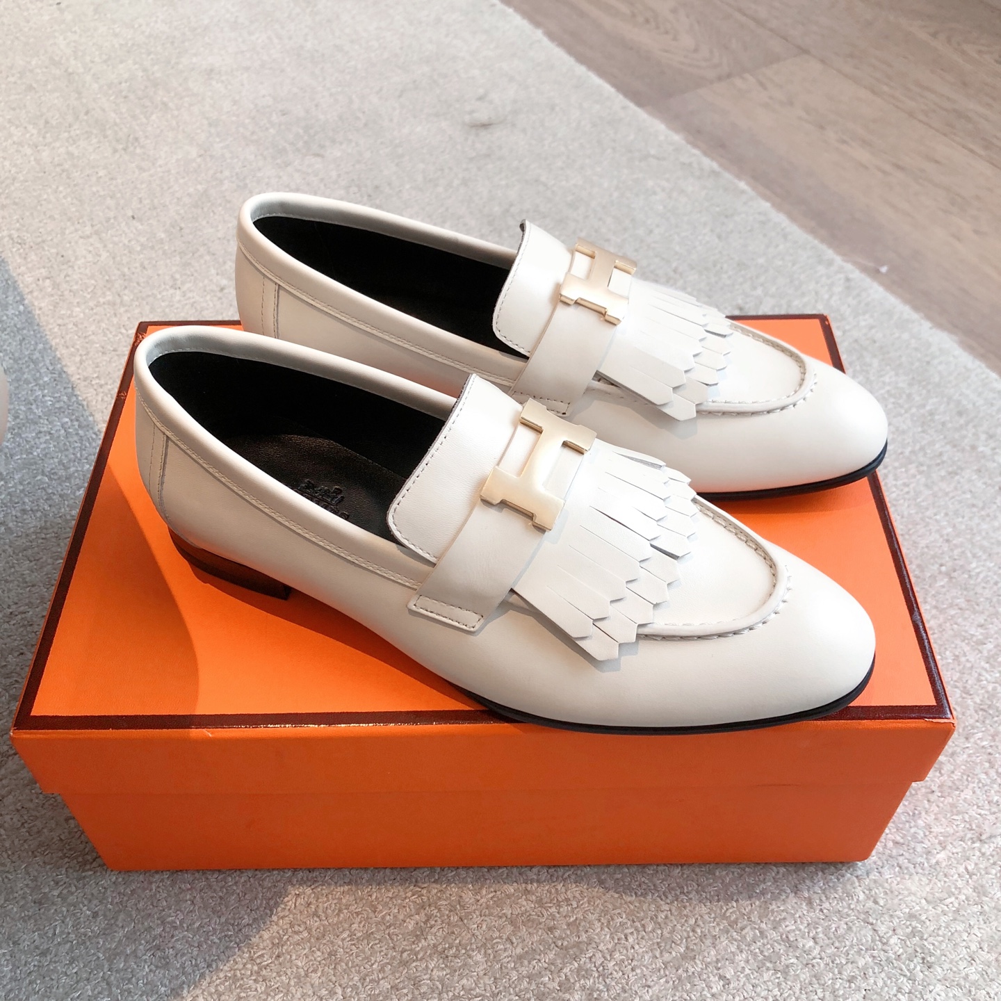 Women’s White Leather Hermes Tassel Loafers with Gold H Logo